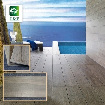 Las baldosas cerámicas esmaltadas del grano de madera no deslizan 200x1000m m que los marrones/broncean color